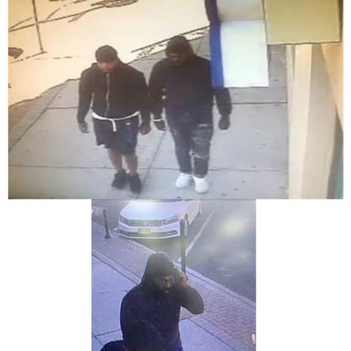 Two men robbed a Newark pharmacy at gunpoint Tuesday, police said.