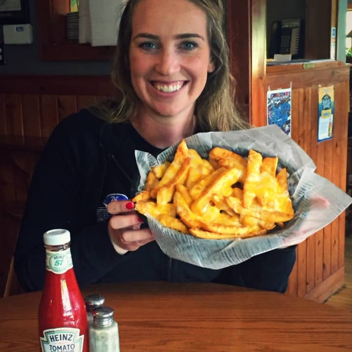 Ellie Quinn with an order of steakfries at Kelly&#x27;s Corner in Brewster.