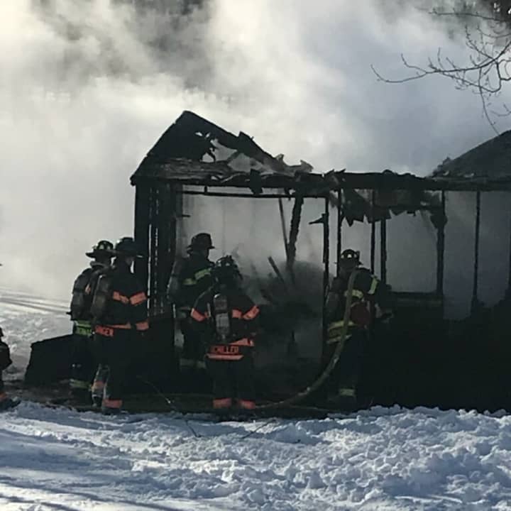 A shed at 12 Jackson Drive in Danbury is destroyed by fire on Friday.