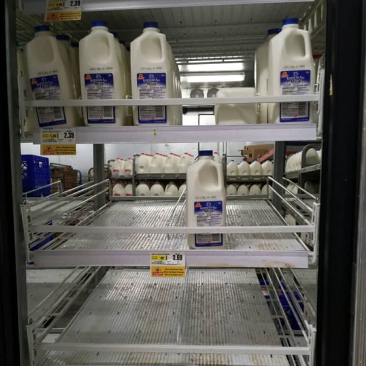 Shelves were looking empty in the milk department at ShopRite in Ramsey Sunday night ahead of the storm.