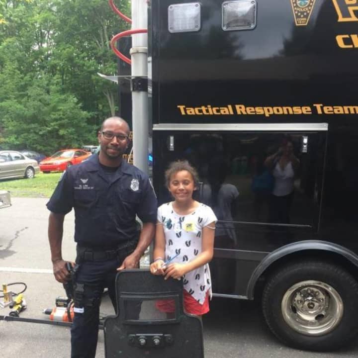Norwalk Police Department Emergency Services Unit Officer Owen Lee brought his truck to a recent law enforcement day for campers.