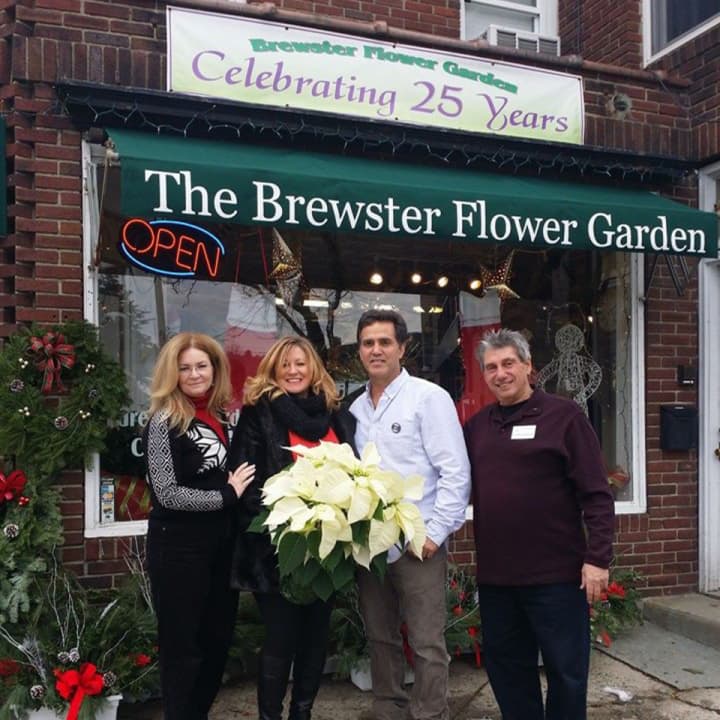 From left, Putnam County Executive MaryEllen Odell business owners Jenn Maher, of J. Philip Commercial Group and the Putnam Chamber of Commerce; Mark Buzzetto, The Brewster Flower Garden; and Geoffrey Reinwald, Brewster Chamber of Commerce.