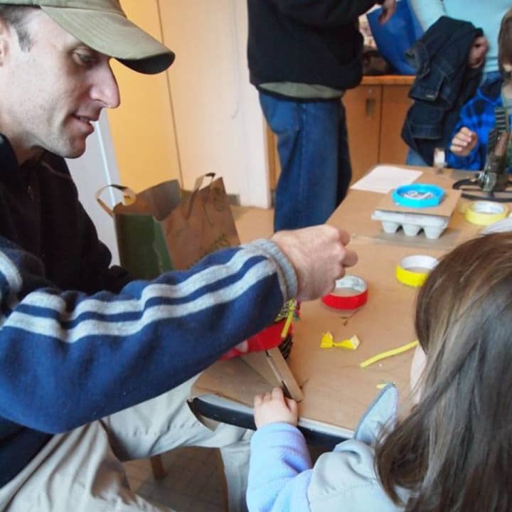 Get a museum pass at the New Rochelle Library and visit to participating museums free or discounted. Here, visitors enjoy Family Day at the Katonah Museum of Art.