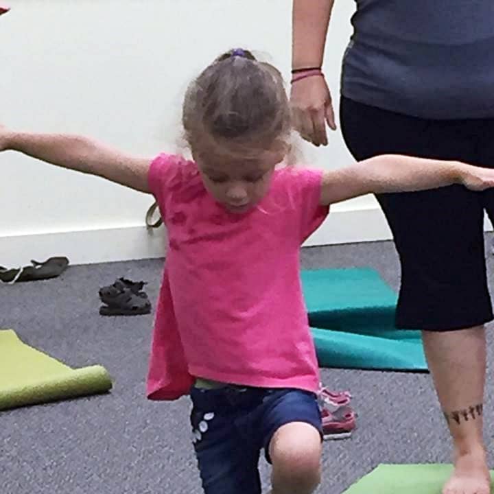 Kids and &quot;their adults&quot; are welcome to come try yoga at Kent Library.