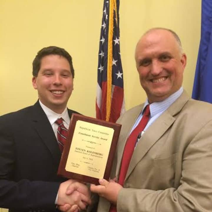 City Rep. Steve Kolenberg receives the Constituent Service Award from Stamford RTC Chairman Fritz Blau.