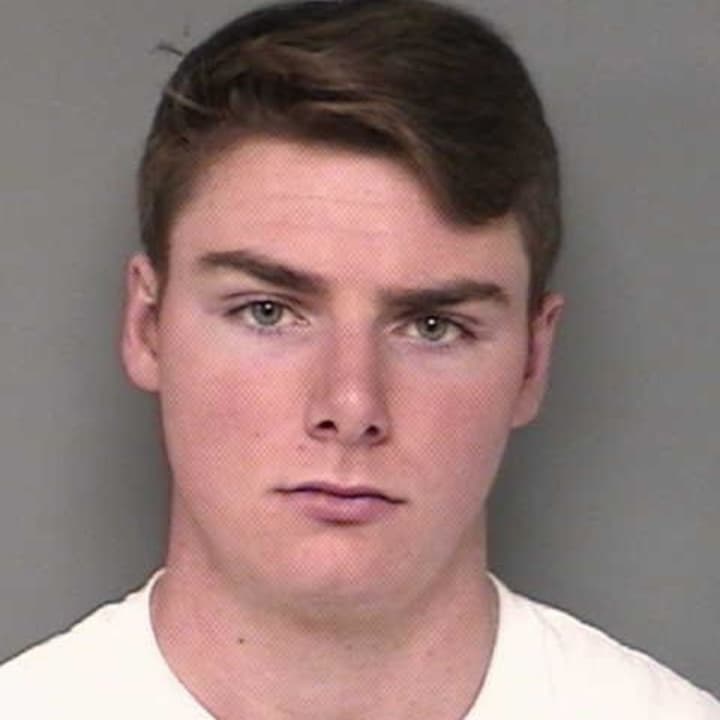 David Kuhn of Sherman was held on $500,000 bond in connection with an arson involving three cars at the University of Connecticut in Storrs.