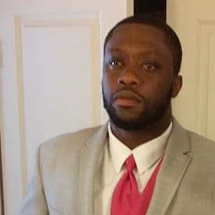 Cadell Moore, 34, of Bridgeport was shot to death while working on his car Thursday morning.