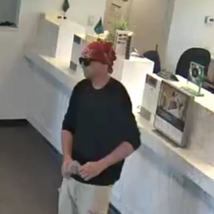 New York State Police are asking for help in identifying the man pictured who is wanted in connection with a bank robbery in Middletown.