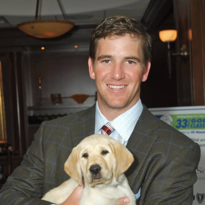 Eli Manning again hosted the Guiding Eyes for the Blind Golf Classic in Mt. Kisco in 2013.