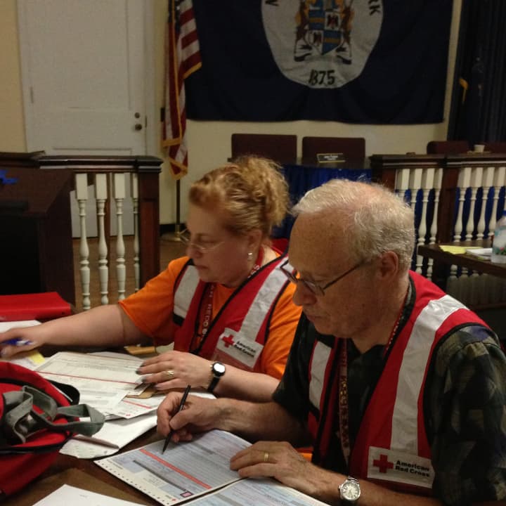 American Red Cross Volunteers Fred and Nancy Stein, of Chappaqua, and three other volunteers assisted the 15 people displaced by the June 24 fire in Mount Kisco. 