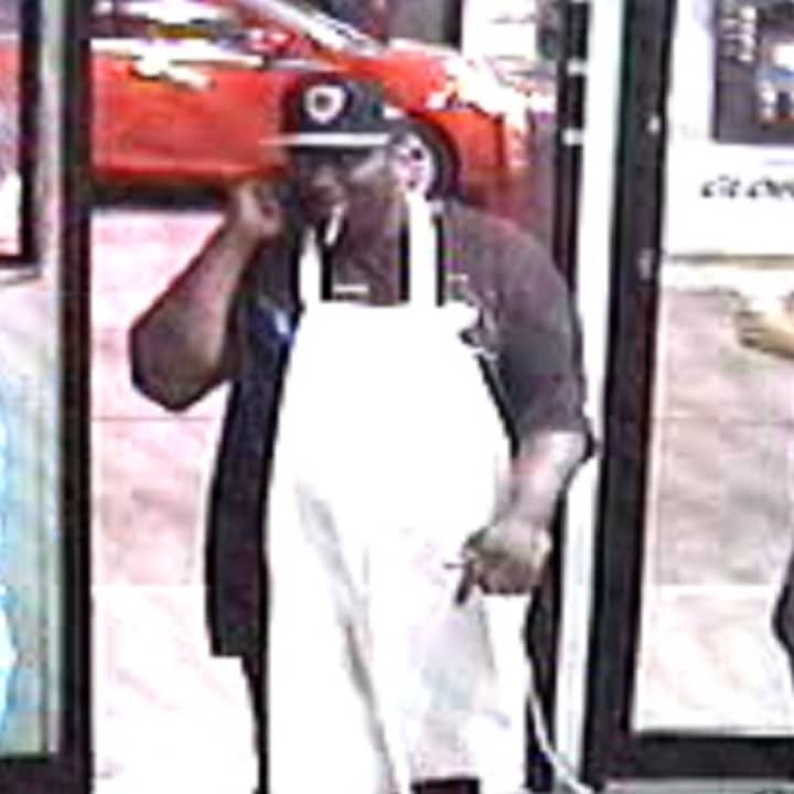 The man in the above photo is wanted for questioning regarding a robbery in Norwalk on June 14. 