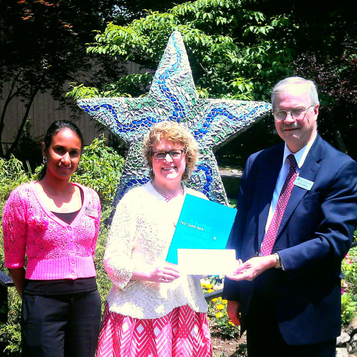 David Van Buskirk, business development officer of First County Bank; Katie Banzhaf, executive director of STAR and Connie Spearman, assistant vice president and branch manager of the Westport Avenue branch of First County Bank.