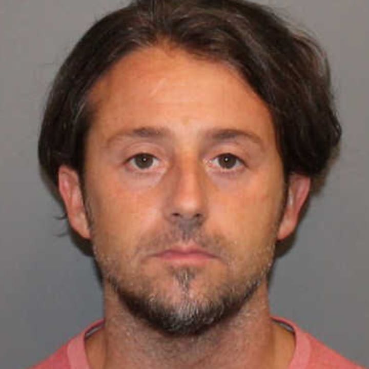 Garrison Manne, 35, of Weston was charged with drug possession, possession near a school and motor vehicle offenses by Norwalk Police on Monday.