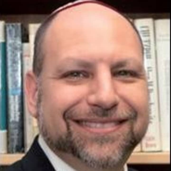Rabbi David Holtz leads a class on the Torah every Wednesday morning at Temple Beth Abraham.