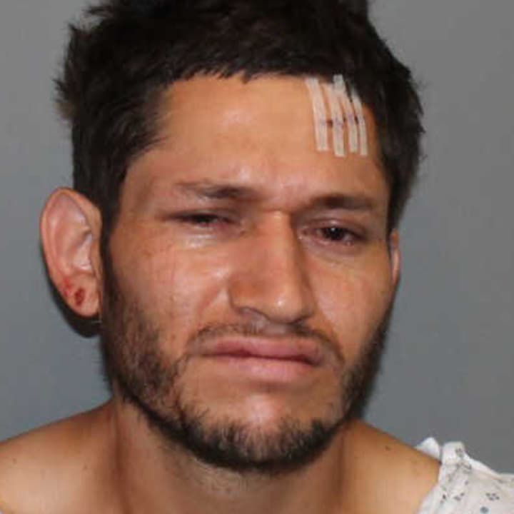 Juan Sarmiento-Arizaga, 25, of Norwalk was charged with attempted assault on a police officer, interfering with police and disobeying an officers signal Sunday.