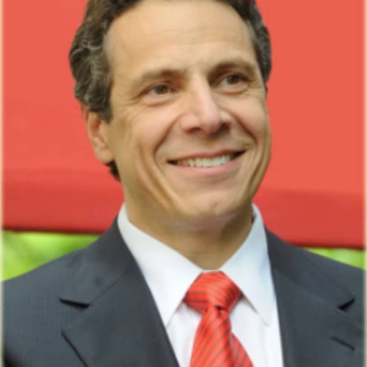 Gov. Andrews Cuomo helped to distribute gifts to the Family YMCA in Yonkers.