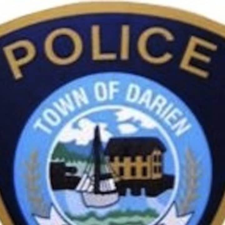 Darien Police issued an infraction to a Stamford man seen driving with a light pole sticking out of his car Saturday.