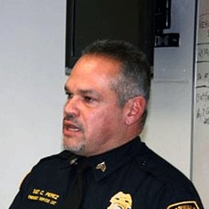 Norwalk Police Sgt. Charlie Perez retired after 27 years on the force. 