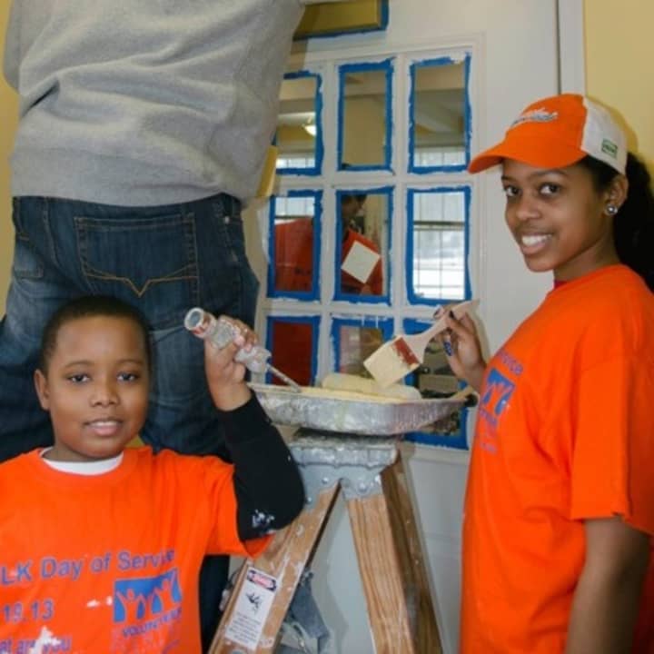 Volunteers paint at the Huguenot Children&#x27;s Library, a branch of the New Rochelle Public Library, at last year&#x27;s MLK Day of Service.
