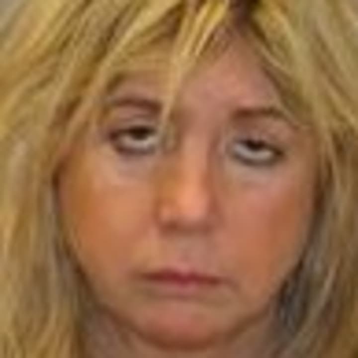 Lisa Rossi of Greenburgh was charged after striking a New York State Police vehicle Saturday on the Sprain Brook Parkway.