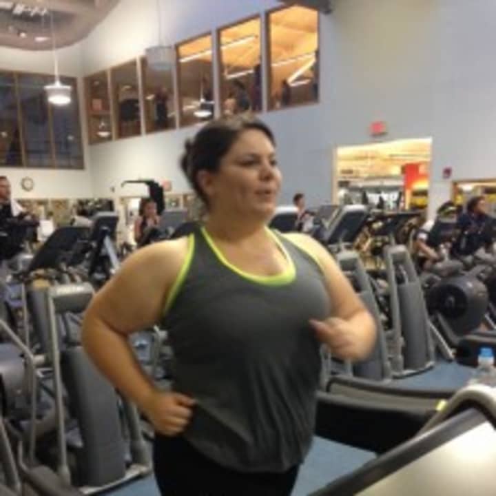 Club Fit&#x27;s Kendra Ekelund runs on the treadmill using Tabata training.
