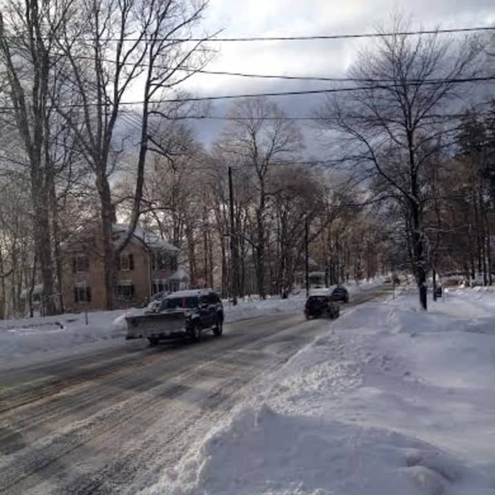 Roads are covered with snow Friday morning in Ridgefield after the overnight storm. 