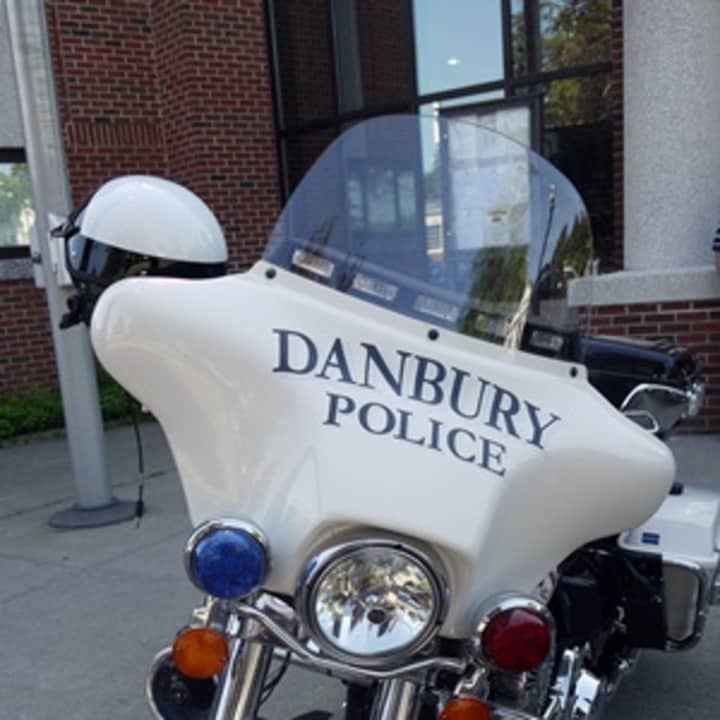 Danbury Police arrested a local man after he was allegedly threatening people with a stolen handgun recently. 