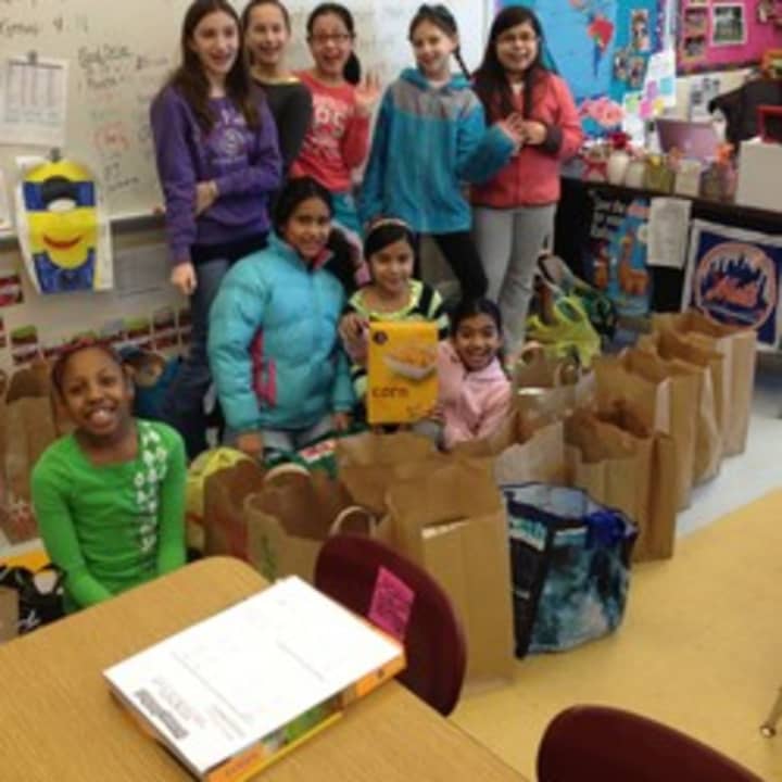 Students from Mount Kisco Elementary School helped participate in a food drive and fundraiser for the Mount Kisco Food Pantry recently.