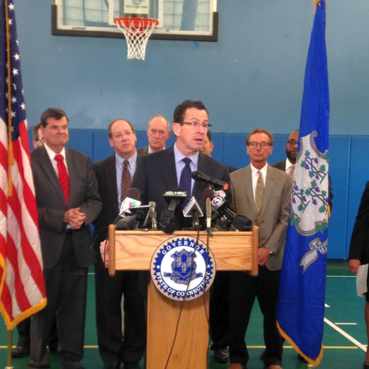 Gov. Dannel Malloy announces his bill Wednesday at the Trinity College Boys &amp; Girls Club, which boasts a tobacco resistance and awareness program for club members ages 13 to 15 funded by the Tobacco and Health Trust Fund.