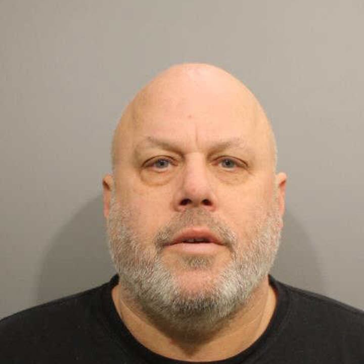 Wilton resident Michael Waldman was charged with disorderly conduct and second-degree threatening for making threatening comments toward two staff members at Cider Mill School Monday morning, police said.