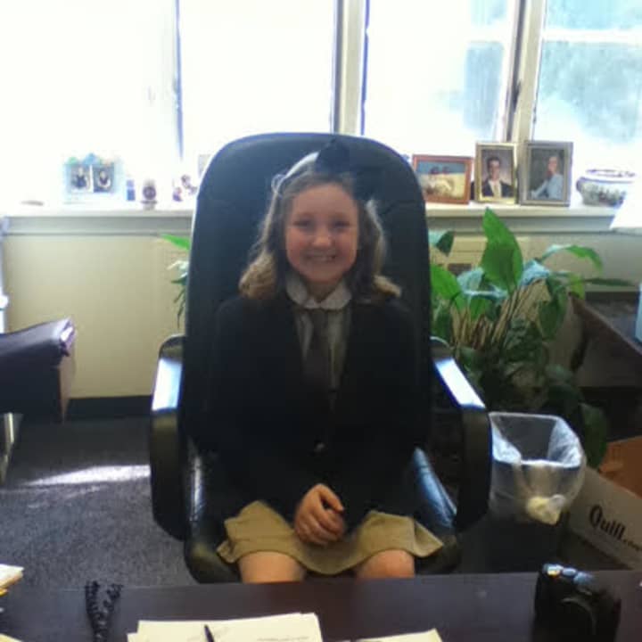 Second-grade student Hadley Faulstich at the principal&#x27;s desk  recently.
