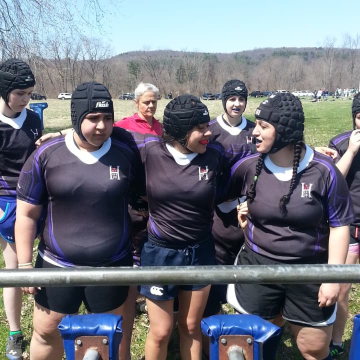 Brianna Casino, Mary Martinez of Bedford Hills, and Claudia Smith of South Salem hit the scrum sled for the first time together before the match.  Also pictured, loose forwards, Shelby Moore, Caroline Zide, and Julia DeNigris of Somers.
