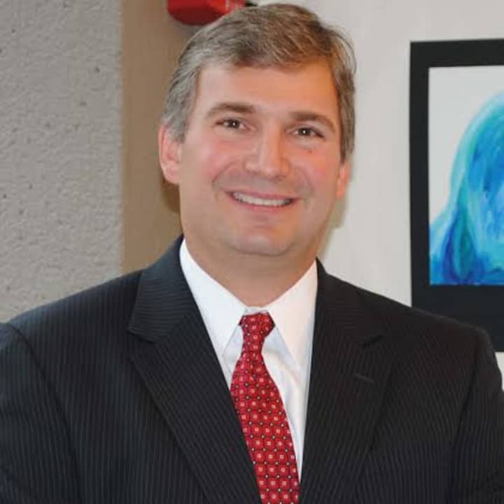 Bryan Luizzi, principal of New Canaan High School, will take over the reins as interim superintendent.