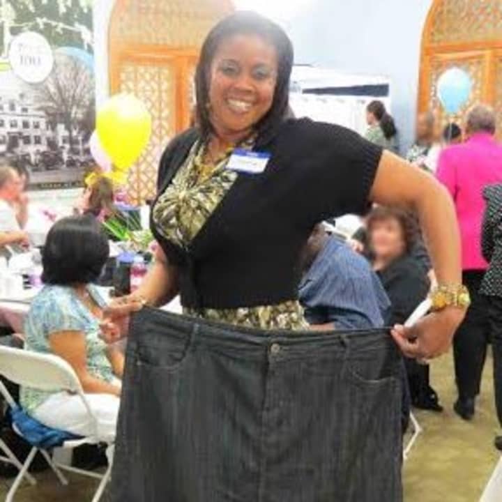 Princess Ware holds old pants after losing 112 pounds after weight loss surgery at Lawrence Hospital Center in Bronxville.