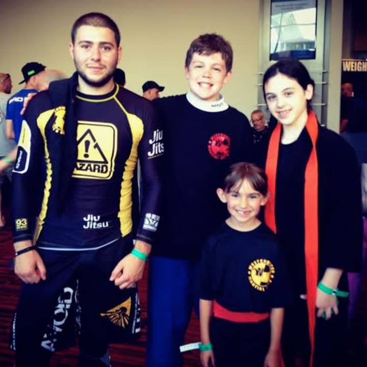 Competing at the recent NAGA competition, from left, grappling coach/instructor Ron Barone, Aidan Connolly, Lauren Naclerio and Alexa Grassi.