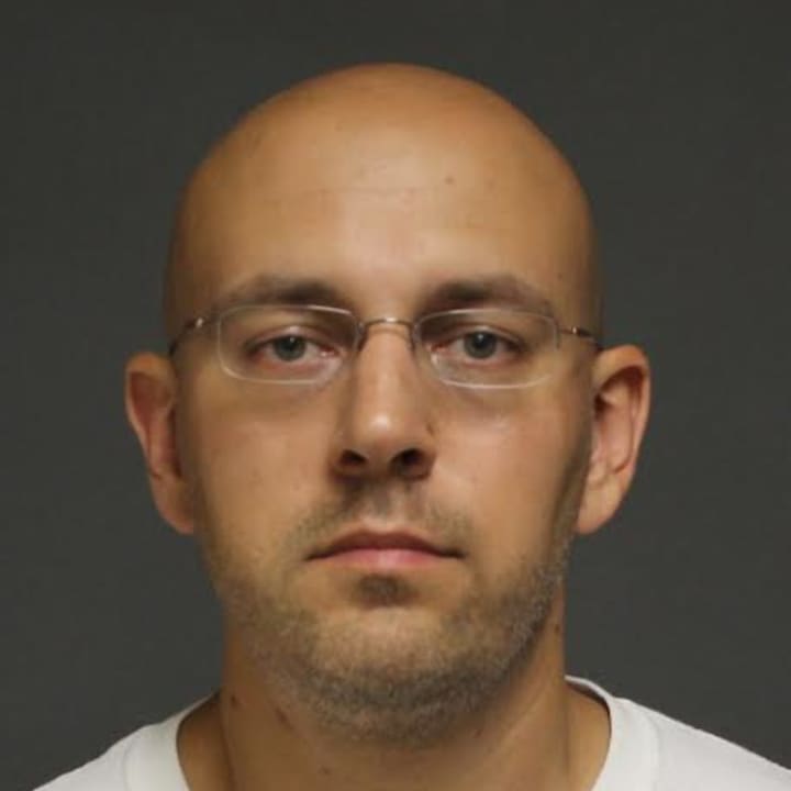 Fairfield resident Allen Liptak, 38, was charged by police with disorderly conduct and violation of a protective order and brought to the police station for processing.