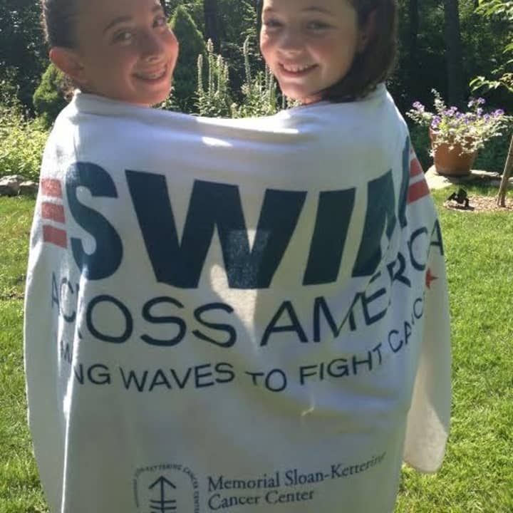 Swim Across America swimmers Nora Kuduk and Kate Posner.