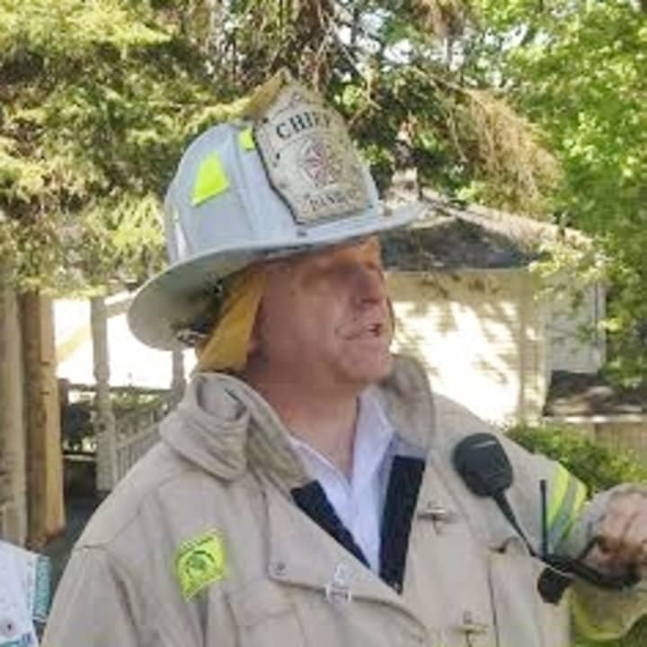 Danbury Fire Chief Geoff Herald, at a house fire last year, is officially retiring this weekend. 