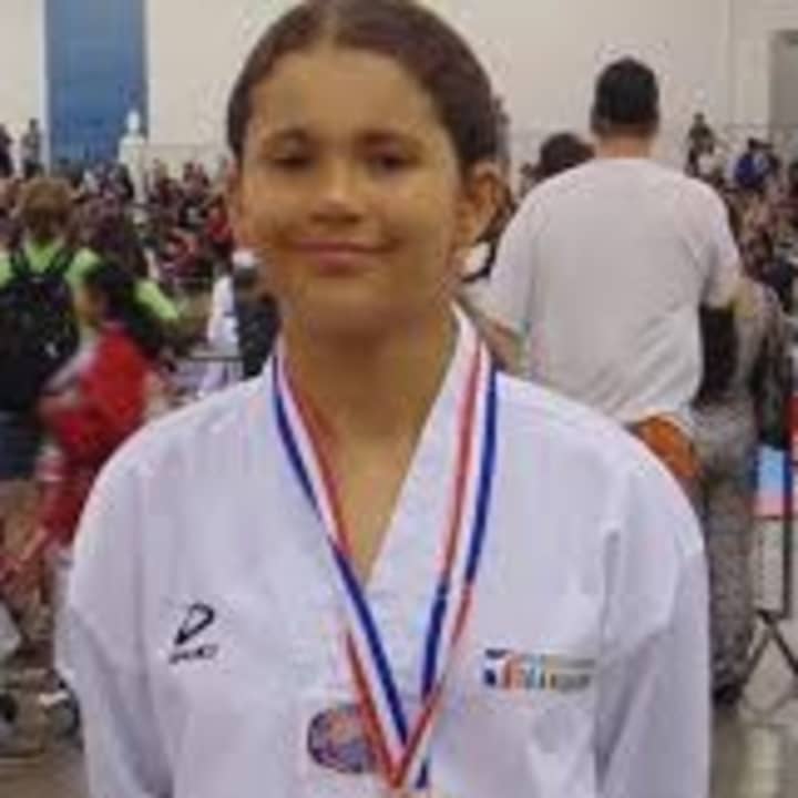 Emily Fields, 11, of Wilton won a gold medal recently at the Taekwondo National Championships in San Jose, Calif. 