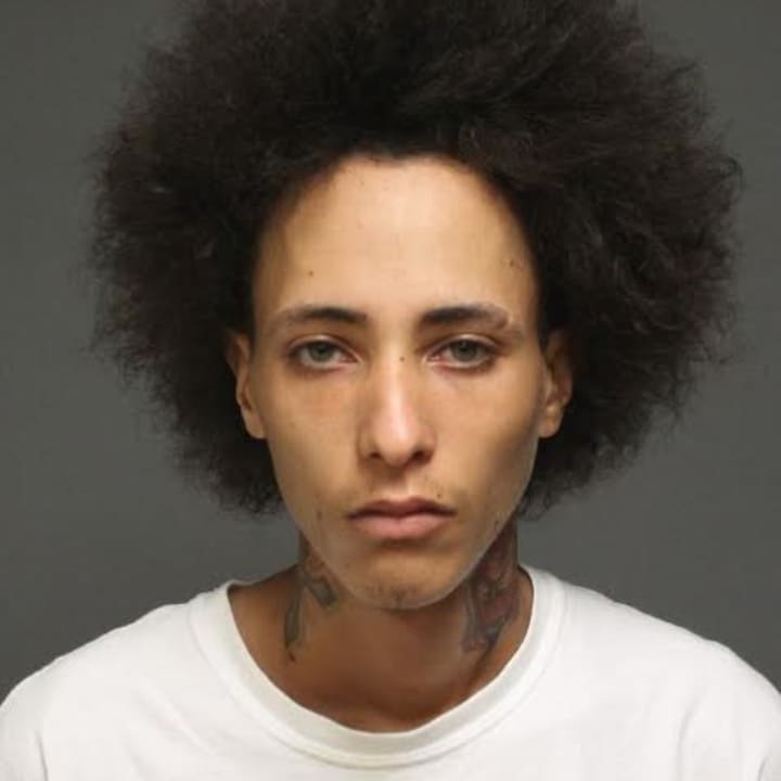 Miguel Rolon Martinez of Bridgeport and a 17-year-old male were charged with several counts of burglary after finding stolen laptops in his car. 