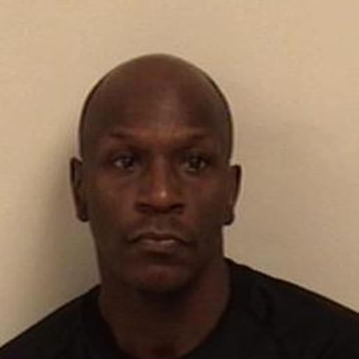 Dean Henton, 47, of Waterbury was charged with stealing credit cards in Westport on Saturday, according to police.