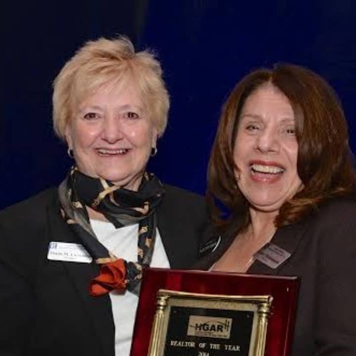 Diane Cummins, HGAR President and Carol Christiansen, HGAR Realtor of the Year for 2014.