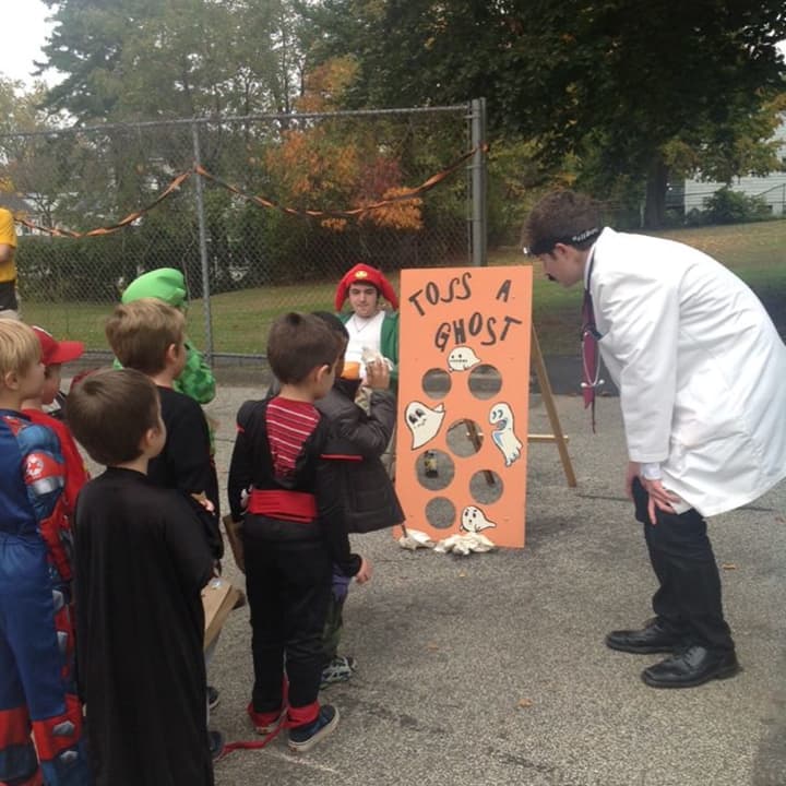 Irvington High School students dressed in costume and facilitated games at Dows Lane&#x27;s Halloween Carnival. 