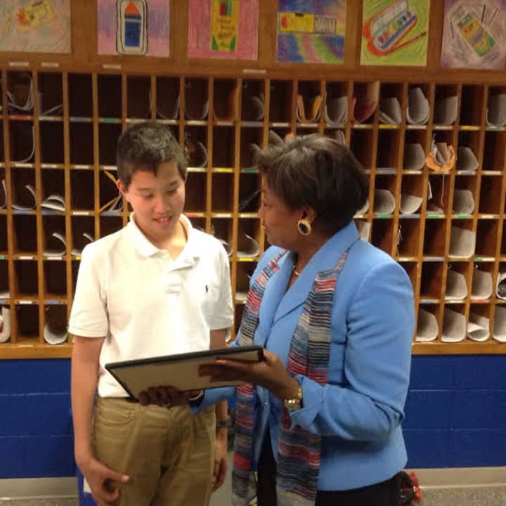 State Sen. Andrea Stewart-Cousins with New Rochelle student Jake Gallins, who is working with military families.