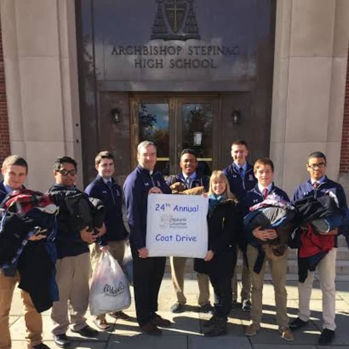 Stepinac High School students and faculty members join together to collect coats for The Children&#x27;s Collective&#x27;s Coat Drive. 