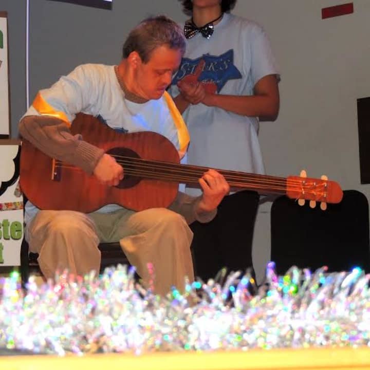 Bobby Vento of Norwalk performs with guitar at Theater of STARs.