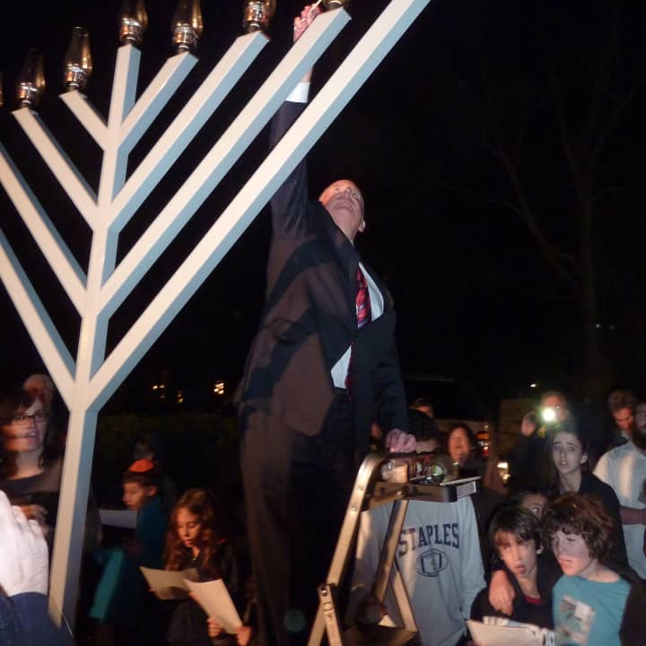 The Westport community will join together for a Menorah lighting. 
