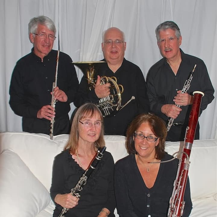 The Madera Winds quintet is comprised of (l-r, back row): Jan van den Berg (flute), John Harley (horn), Ralph Kirmser (oboe); (l-r, seated): Janet Atherton (clarinet) and Rosemary Dellinger (bassoon). 