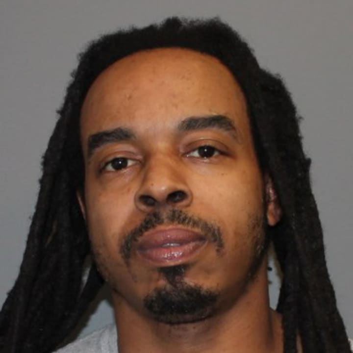 Andre Dawson, 37, was charged with criminal possession of a firearm after police said his DNA was found on a gun recovered in August.