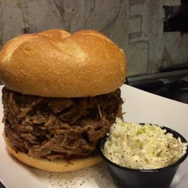 License 2 Grill&#x27;s Pulled Pork Sandwich with Hand Cut Cole Slaw.